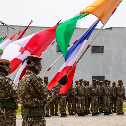 Nigerien Soldiers present the flags representing each participating country during Flintlock near Abidjan, Côte d’Ivoire, March 7, 2023. Exercises and engagements like Flintlock highlight and improve joint force capabilities across all domains and strengthen relationships with partners in Africa and worldwide. (U.S. Army photo by Sgt. Ashlind House)