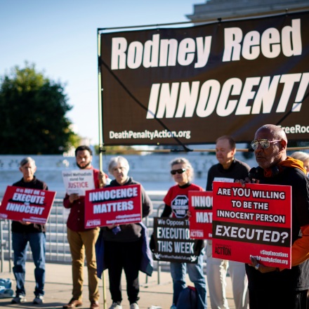 A demonstrator holding a placard speaks to protest against the death penalty in the Rodney Reed v. Bryan Goertz case in front of the Supreme Court Building. (Photo by Jordan Tovin / SOPA Images/Sipa USA)(Sipa via AP Images)