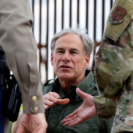 Texas Gov. Greg Abbott visits San Benito, Texas, near a U.S. border fence construction site, Jan. 30, 2023.