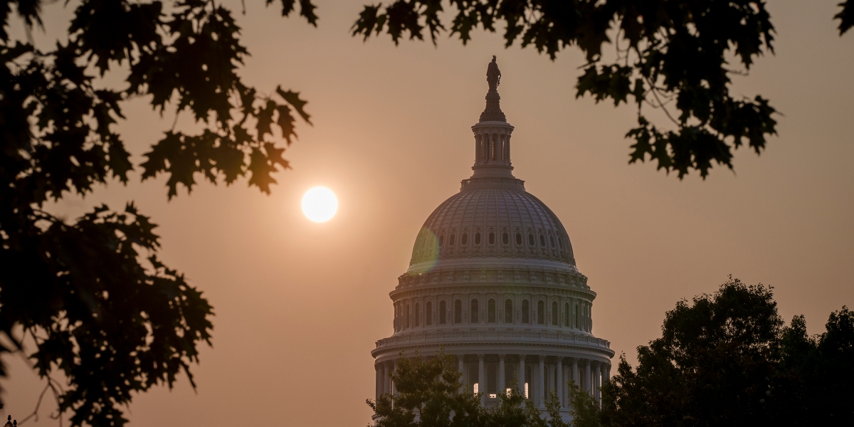 The Capitol is seen at sunrise in Washington, Friday, June 9, 2023. While the air quality remains unhealthy, the record smoke pollution from wildfires in eastern Canada this week has diminished significantly over the nation's capital. (AP Photo/J. Scott Applewhite)
