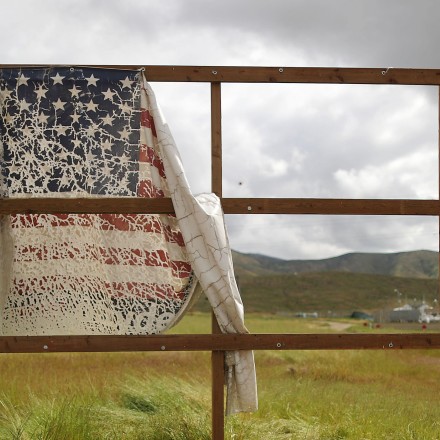 OTAY MESA, CALIFORNIA - APRIL 03: An old billboard which displayed a U.S. flag stands on the U.S. side of the U.S.-Mexico border on April 3, 2019 in Otay Mesa, California. U.S President Trump told reporters last week “there's a very good likelihood” that he will close the U.S. Southern border this week.  (Photo by Mario Tama/Getty Images)