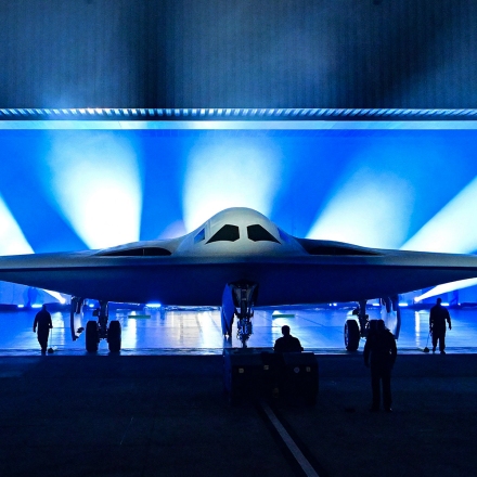 The B-21 Raider is unveiled during a ceremony at Northrop Grumman's Air Force Plant 42 in Palmdale, California, December 2, 2022. - The high-tech stealth bomber can carry nuclear and conventional weapons and is designed to be able to fly without a crew on board. The B-21 -- which is on track to cost nearly $700 million per plane and is the first new US bomber in decades -- will gradually replace the B-1 and B-2 aircraft, which first flew during the Cold War. (Photo by Frederic J. BROWN / AFP) (Photo by FREDERIC J. BROWN/AFP via Getty Images)
