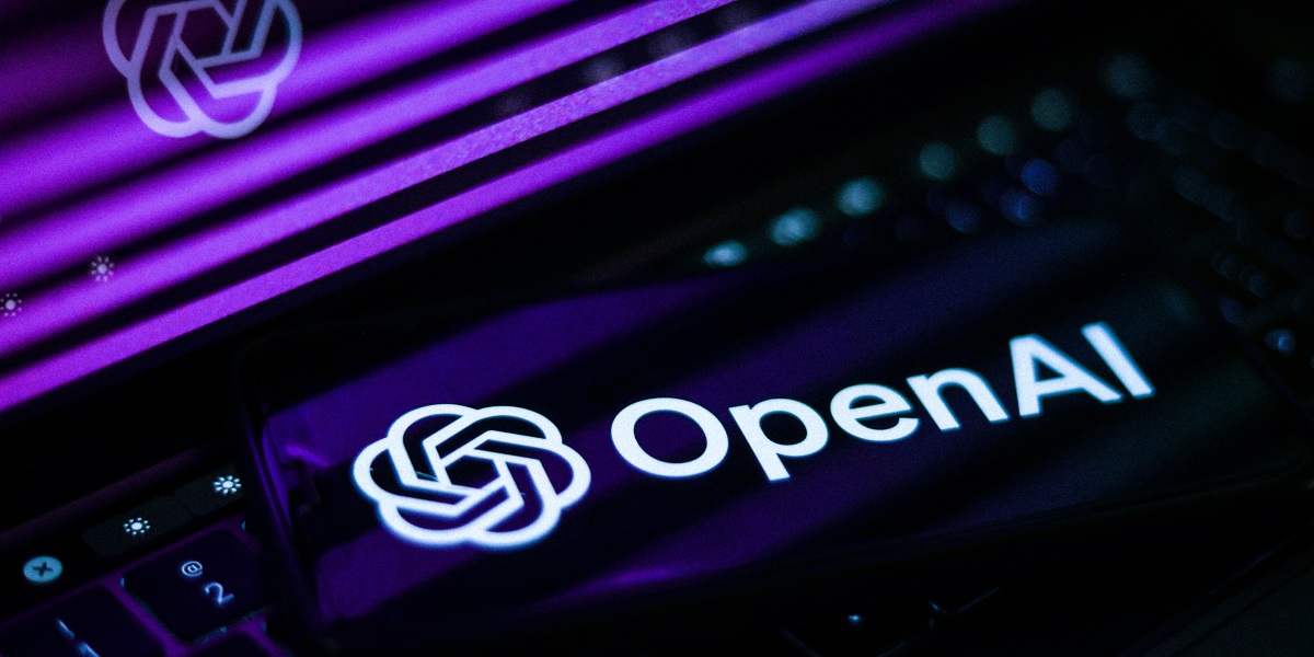 OpenAI website displayed on a laptop screen and OpenAI logo displayed on a phone screen are seen in this illustration photo taken in Krakow, Poland on May 4, 2023. (Photo by Jakub Porzycki/NurPhoto via Getty Images)