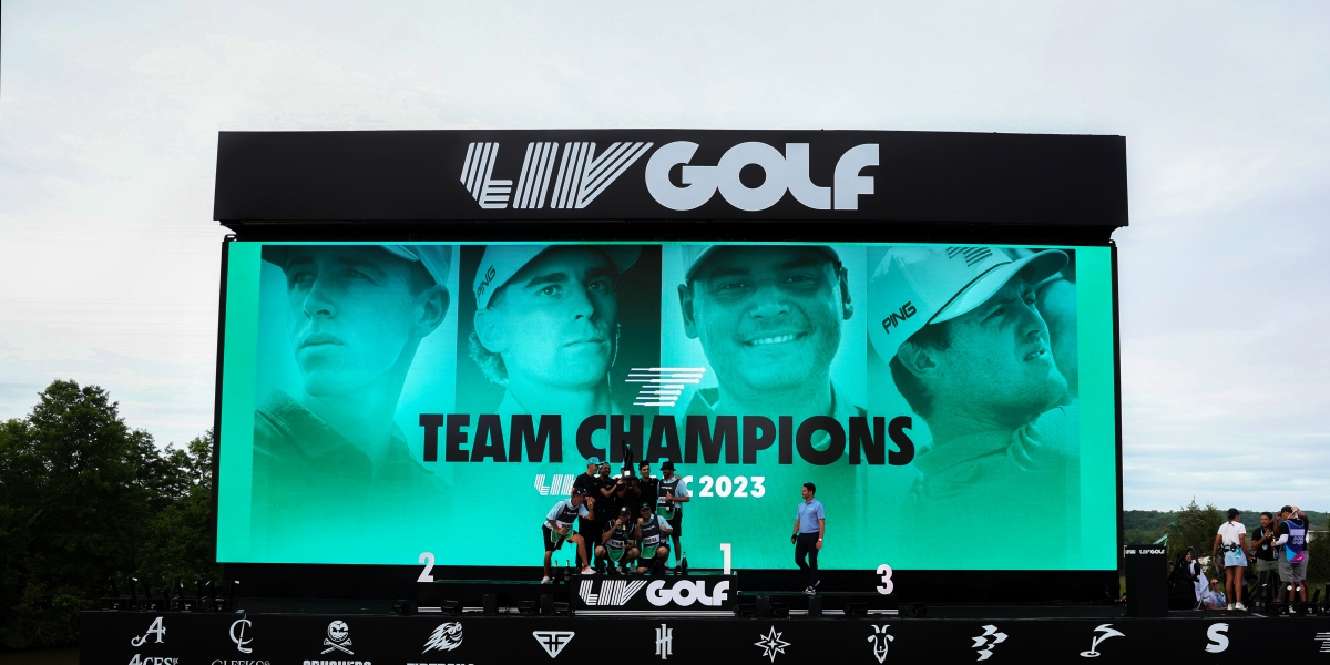STERLING, VIRGINIA - MAY 28: Members of Torque GC celebrate after winning the team portion of the LIV Golf Invitational - DC at Trump National Golf Club on May 28, 2023 in Sterling, Virginia. (Photo by Rob Carr/Getty Images)