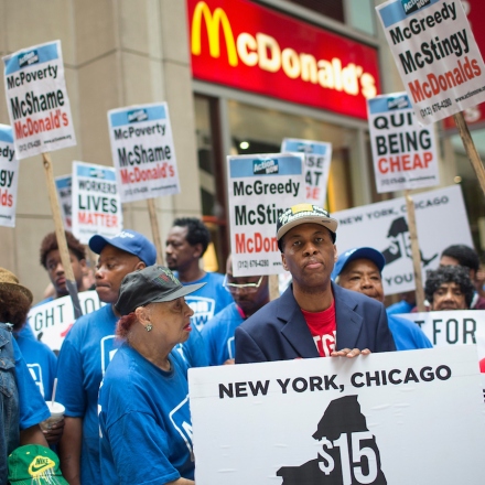 CHICAGO, IL - JUNE 22:  Fast food workers and community activists protest outside a McDonald's restaurant in the Loop on June 22, 2015 in Chicago, Illinois. The protestors were calling for an increase in the minimum wage to $15-dollars-per-hour. The demonstration was staged to coincide with the 4th hearing of the Wage Board in New York City as it debates the $15-dollar-per-hour increase for its workers.  (Photo by Scott Olson/Getty Images)