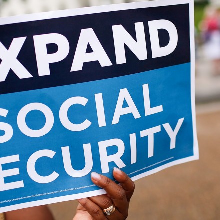 WASHINGTON, DC - JULY 13:  Activists participate in a rally urging the expansion of Social Security benefits in front of the White House July 13, 2015 in Washington, DC. Social Security Works, the AFL-CIO and additional organizations held the event to deliver "more than 2 million petition signatures" in support of expanding Social Security benefits.  (Photo by Win McNamee/Getty Images)