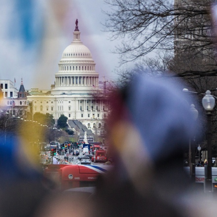 Demonstrators walks past the U.S. Capitol during a protest against the Dakota Access Pipeline (DAPL) in Washington, D.C., U.S., on Friday, March 10, 2017. The Standing Rock Sioux Tribe and Indigenous grassroots leaders arranged for the march to protect native sovereignty, keep fossil fuels in the ground and stop construction of the DAPL project. Photographer: Andrew Harrer/Bloomberg via Getty Images