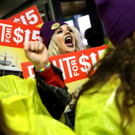 Workers protest for a raise in the minimum wage, at Newark Liberty International Airport in Newark, N.J., Nov. 29, 2016. Thousands of low-wage workers protested in cities across the U.S. on Tuesday to demand a $15-an-hour minimum wage and the right to form a union, shutting down streets and disrupting service at some of the nation's busiest airports. (Chang W. Lee/The New York Times)